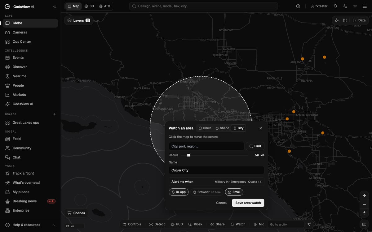 Drawing a 50 km watch area around Los Angeles in GodsView, with the radius slider, alert rules and in-app and email delivery