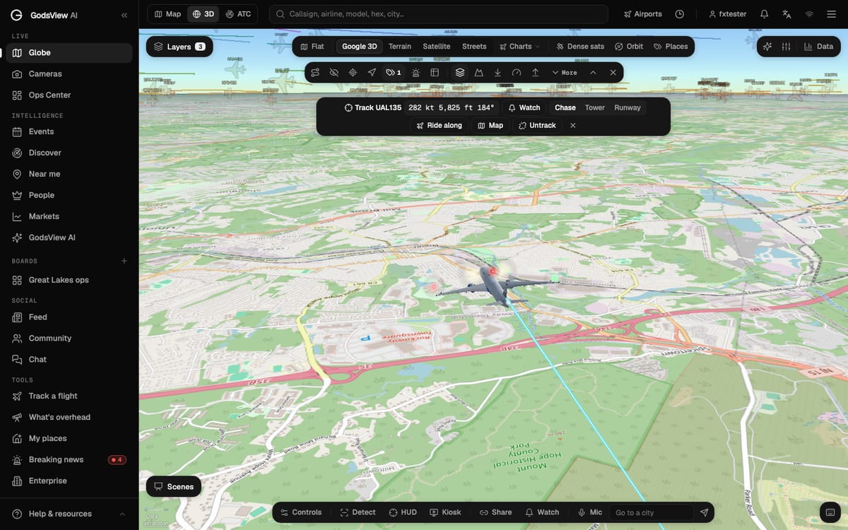 Chase camera behind United UAL135, a Boeing 777, on approach over New Jersey in the GodsView 3D view, with the Chase, Tower and Runway camera choices