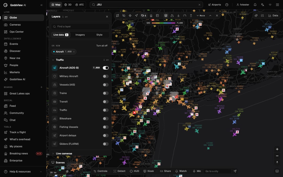 The GodsView Layers panel open on Live data, with Aircraft (ADS-B) switched on and the Traffic group expanded