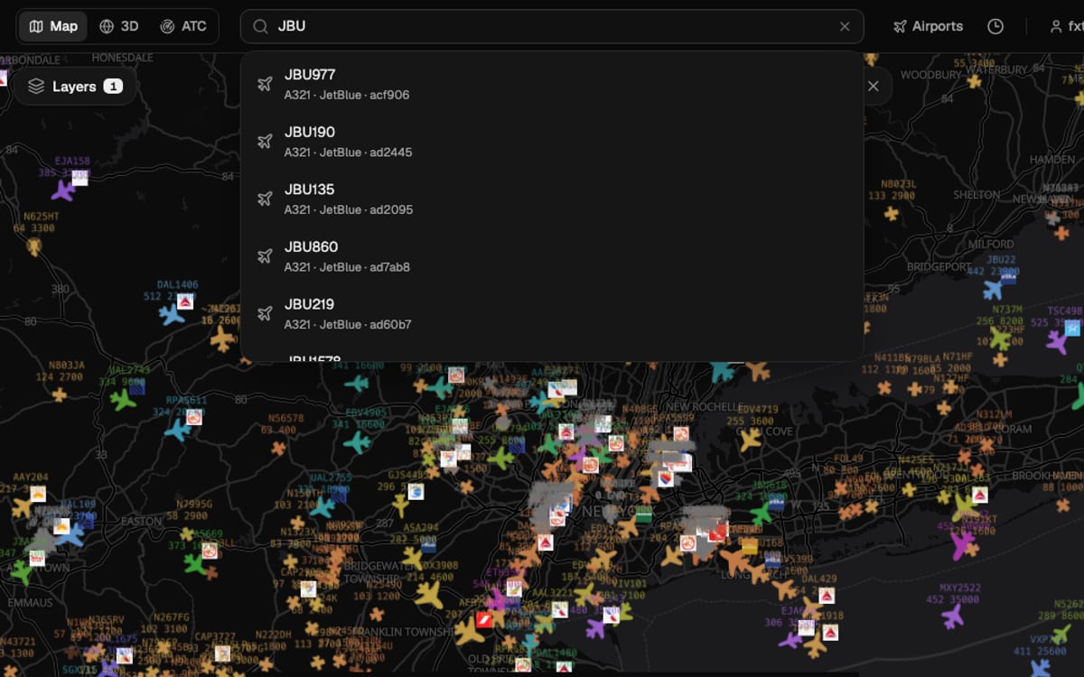 Typing JBU into the GodsView search box lists live JetBlue flights with aircraft type and hex code